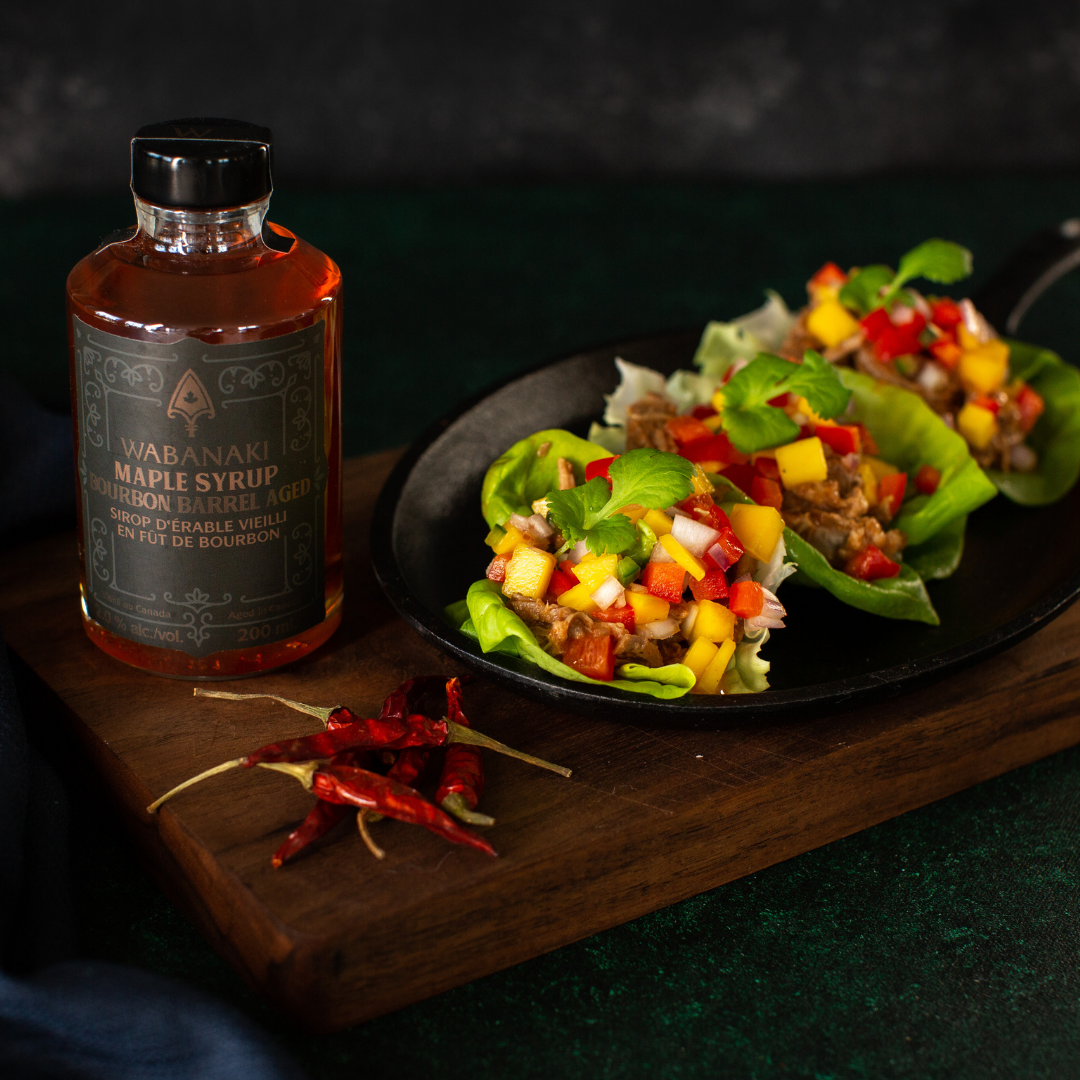 Wabanaki Maple Bourbon Maple Syrup pictured with Slow Cooker Pulled Pork and Mango Salsa