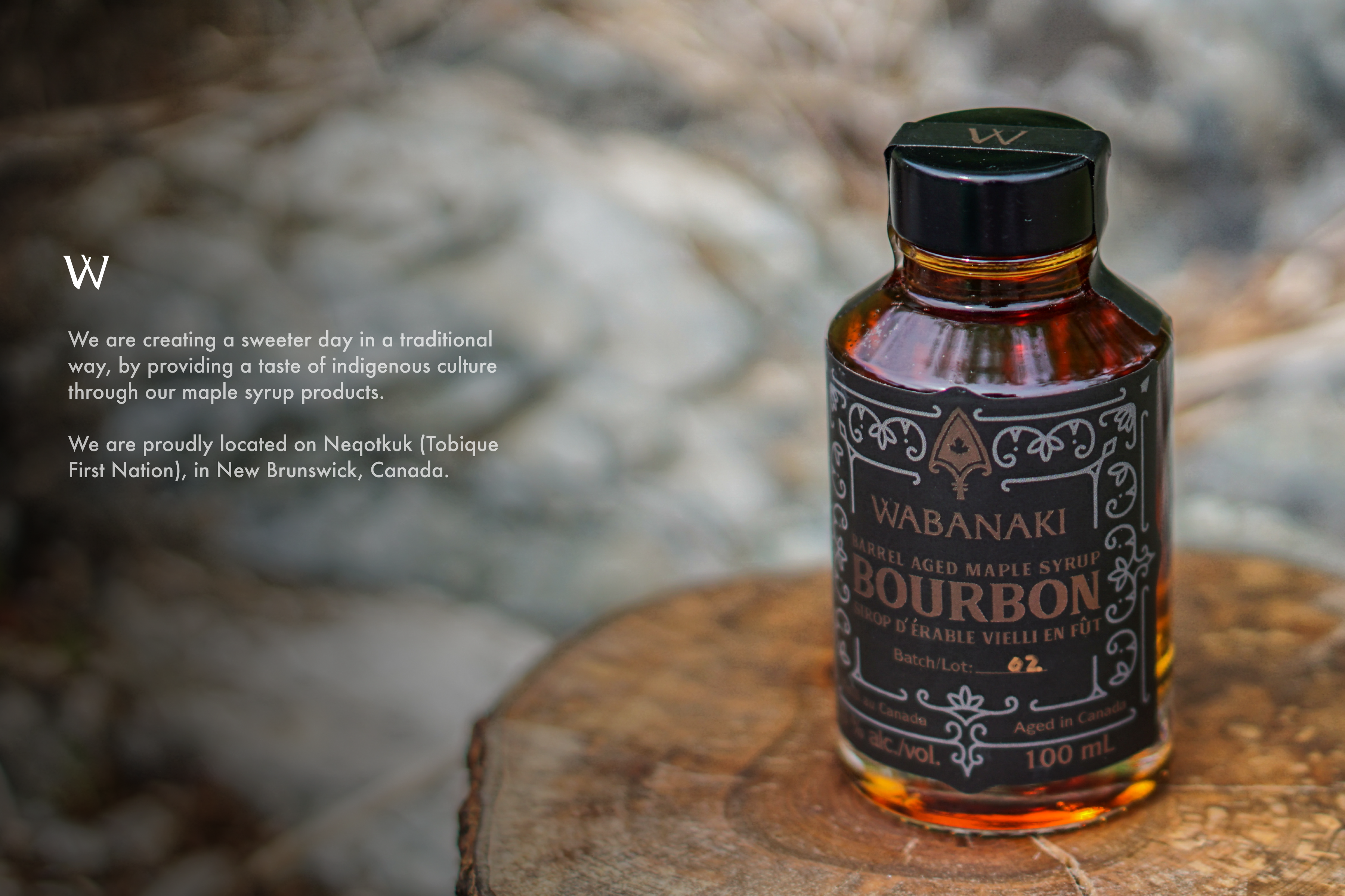 Wabanaki Maple Barrel Aged Bourbon Maple Syrup pictured on the right along with text describing where we are from. 